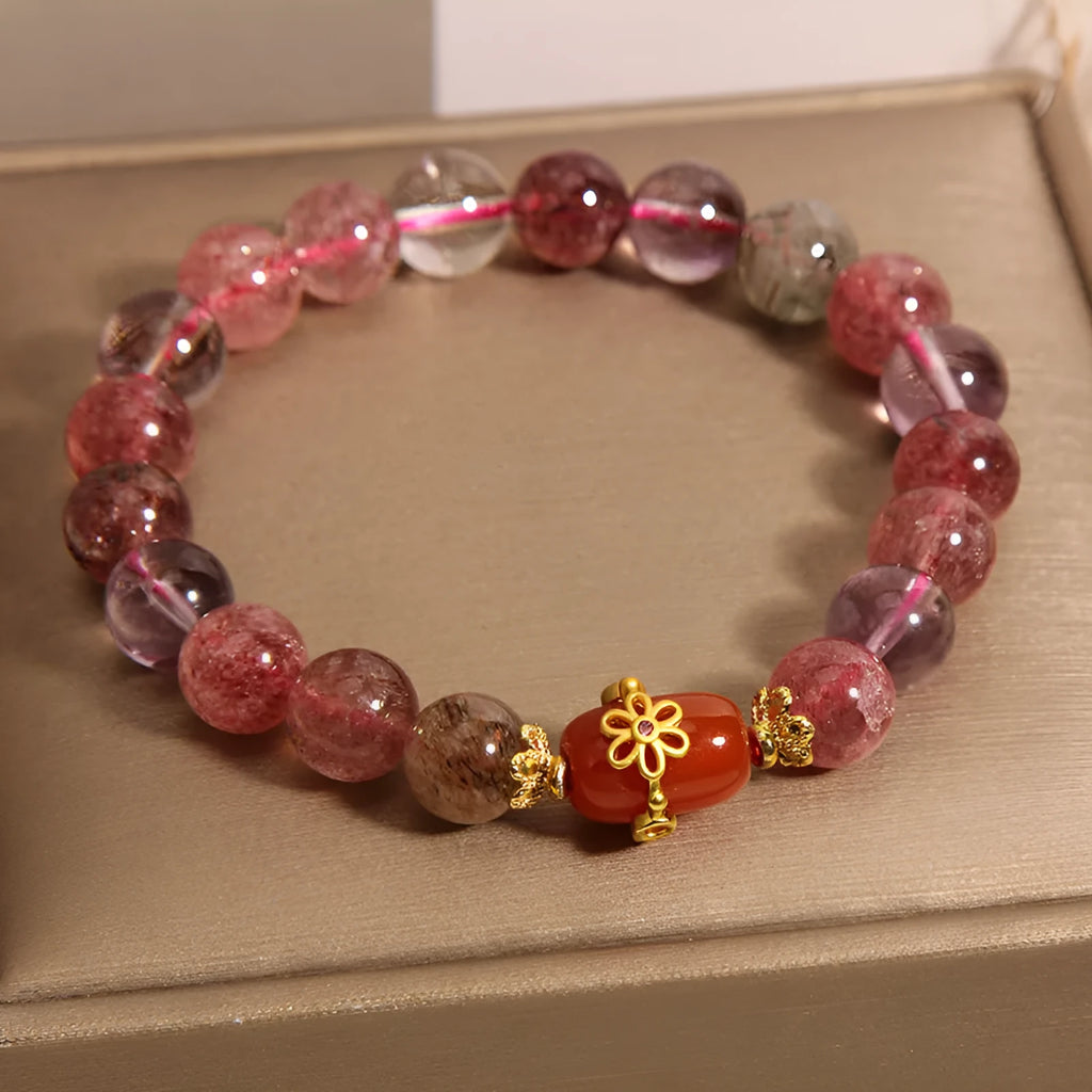 Super Seven crystal bracelet with white crystal and red agate accents on adjustable chain