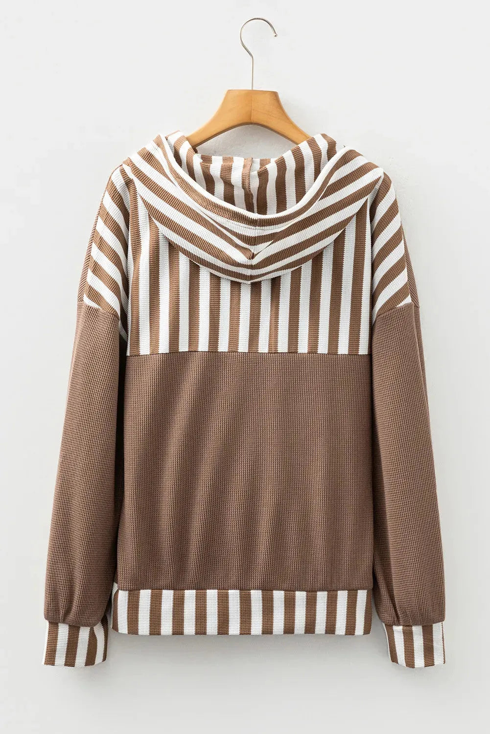 Straw yellow hoodie with waffle texture, striped patchwork design, button neck, and drawstring hood in sizes S M L XL