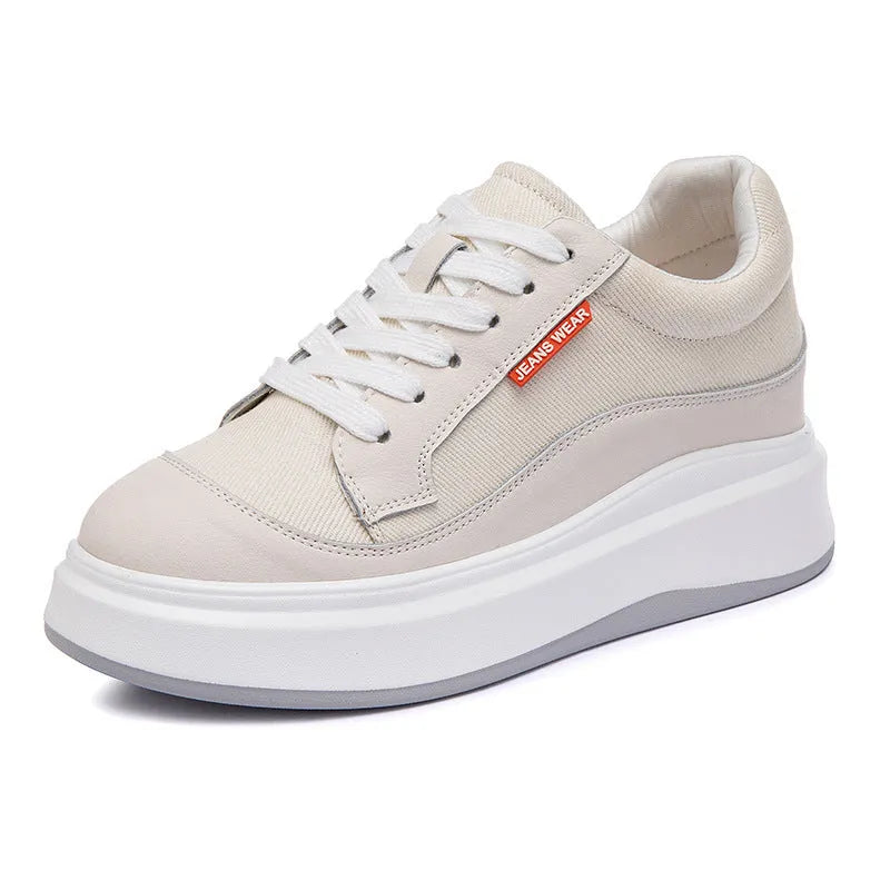 Women's beige and pink leather board shoes with a thick sole, shown from the side.