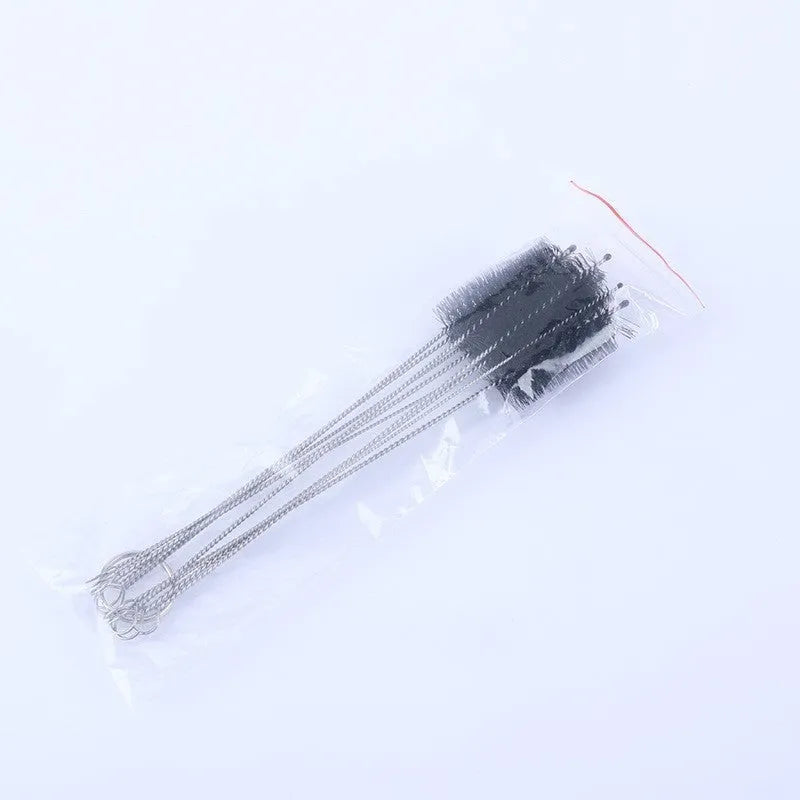Set of stainless steel handled cleaning brushes with white nylon bristles for cleaning reusable straws.