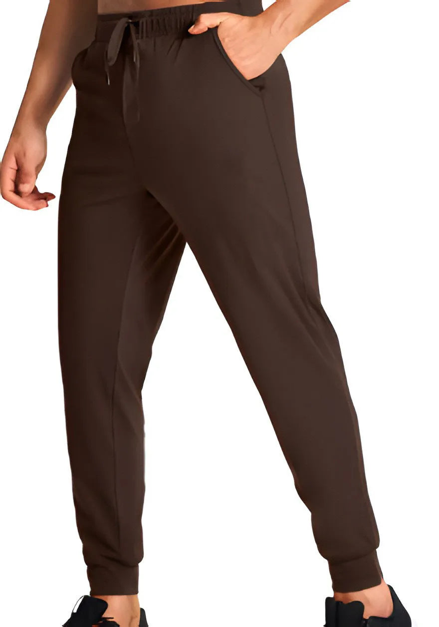 Men's loose casual trousers in solid colour, made from 100% polyester fabric, available in multiple sizes and shades for leisure wear