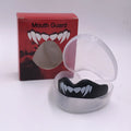 Adult boxing mouthguard with tooth socket design in black/white colour variant showing printed teeth pattern