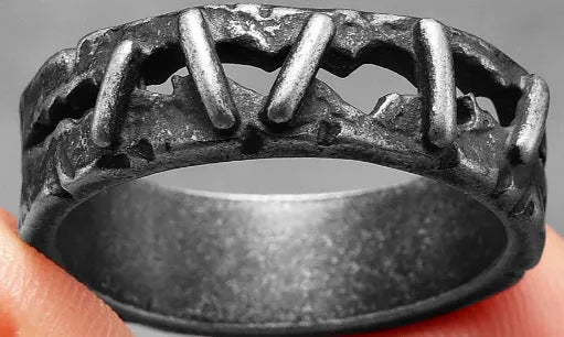 Stainless steel double ring with dark punk stitching style showing layered bands and surface detailing
