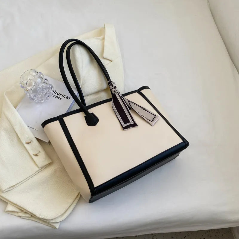 Soft PU leather winter commuter shoulder bag with open pockets and internal organisation compartments