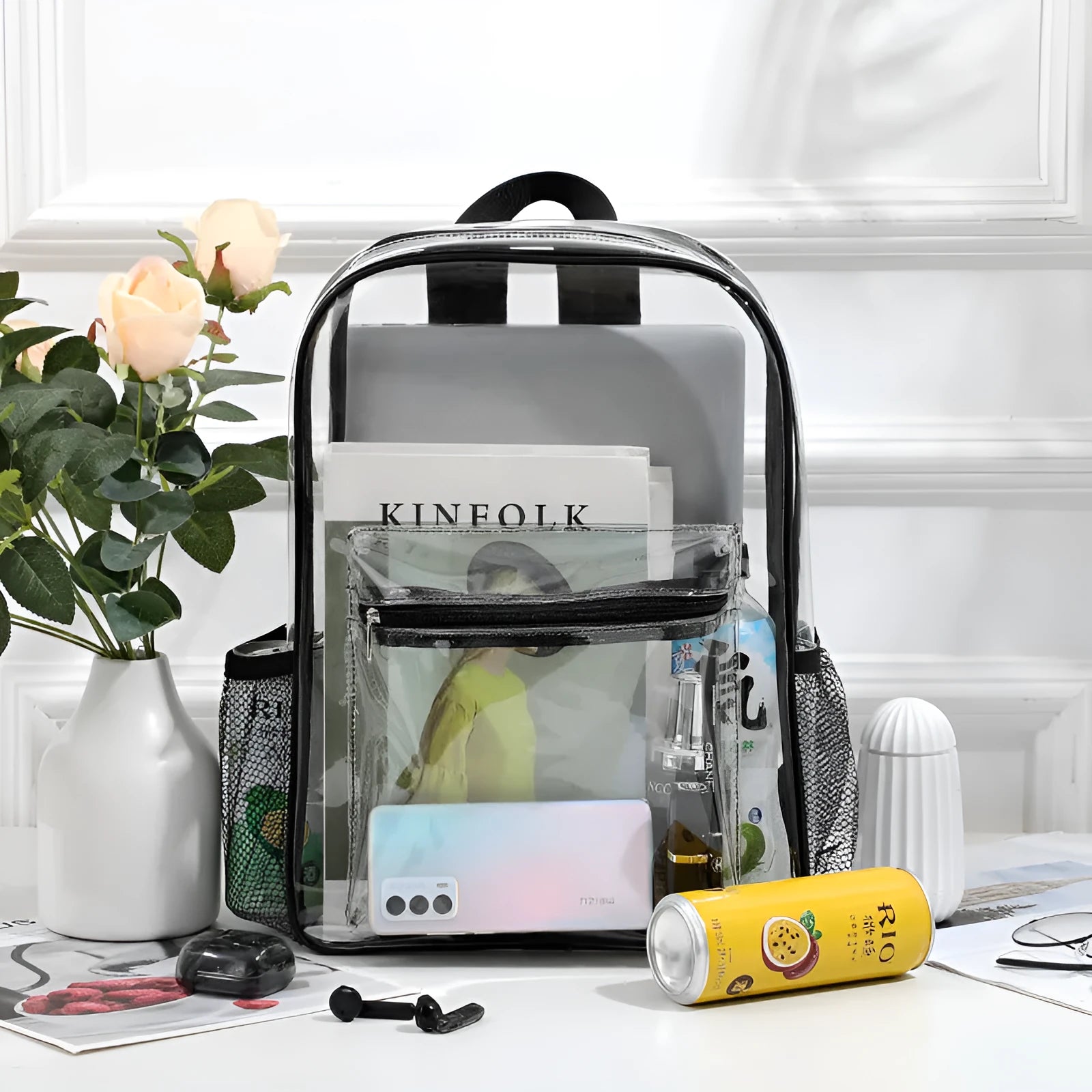 Transparent large PVC backpack in sapphire blue colour, showing contents inside.