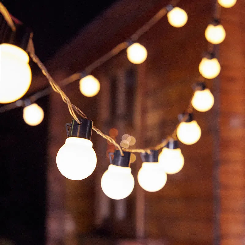 10-metre black solar decorative light string with 40 warm white LED bulbs for outdoor festivals and gardens