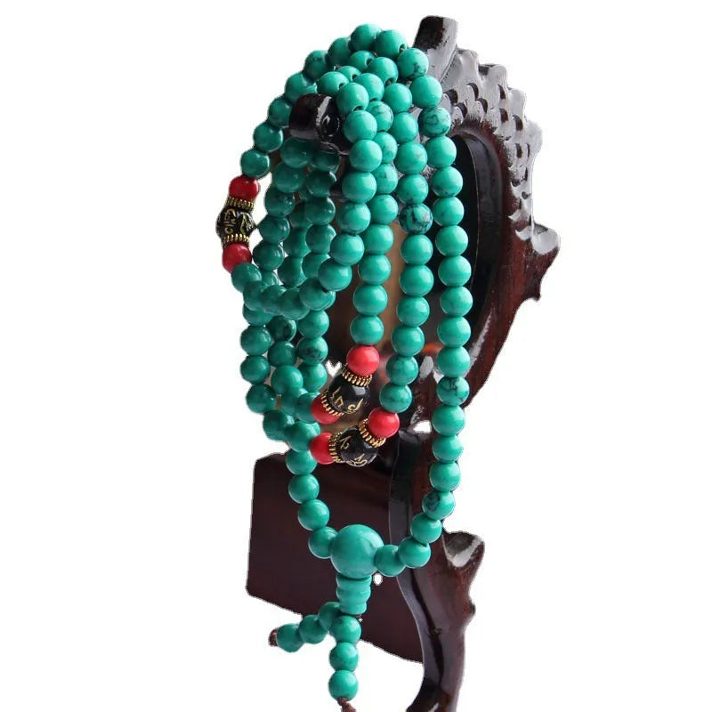 Turquoise Tibetan bracelet with 108 polished beads in 6mm and 8mm sizes