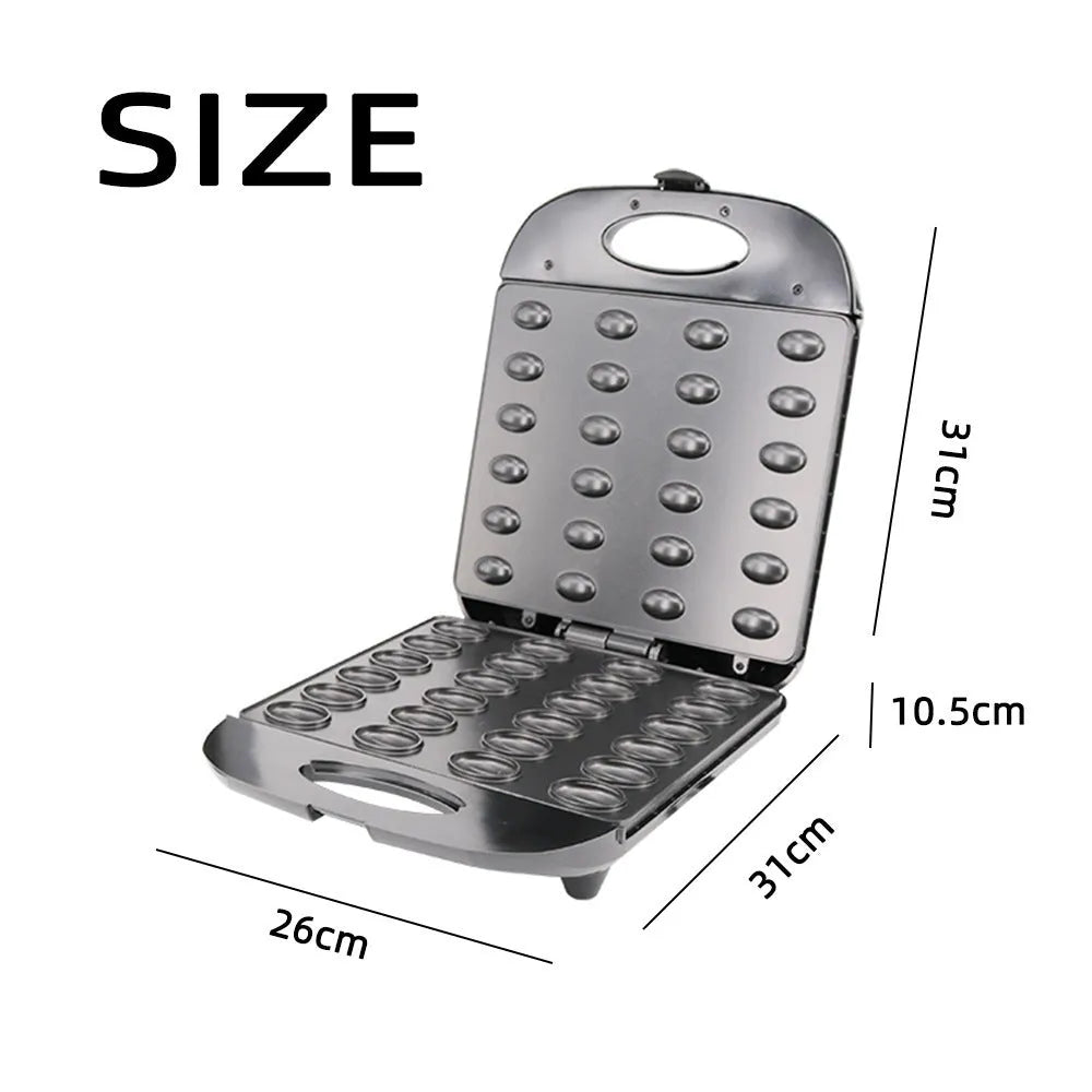 Black countertop nut roasting machine measuring 31cm by 26cm by 11cm.