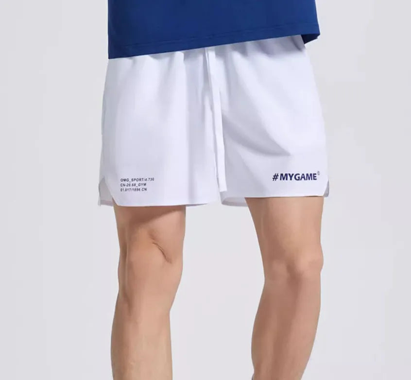 Men's midnight blue training fitness shorts with moisture-wicking fabric on a gym background.