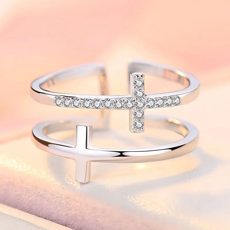 Women's adjustable copper ring with zircon gems in geometry design, showing open and closed positions