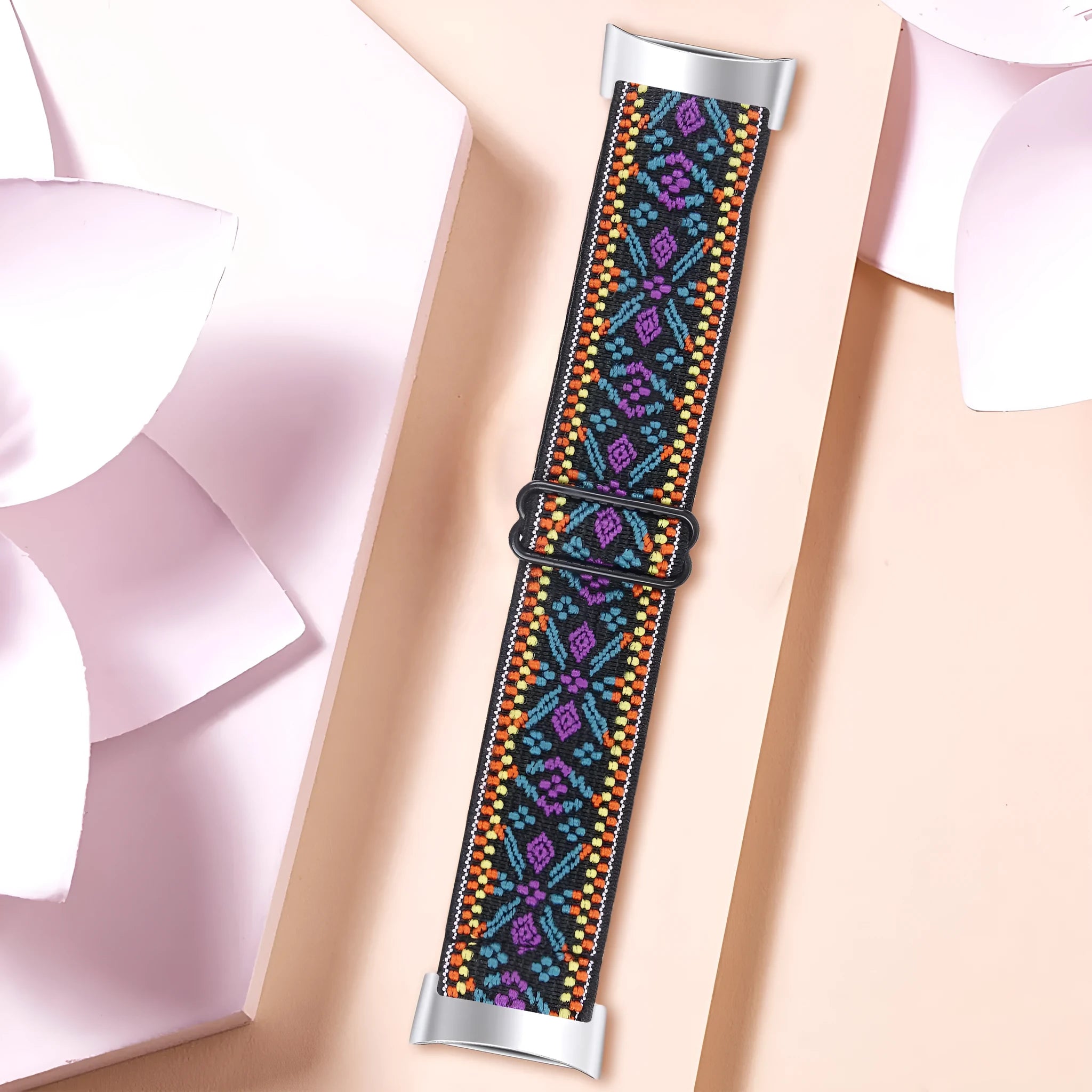 Adjustable printed elastic watch strap compatible with Fitbit Charge 6, shown in a vibrant colour design.