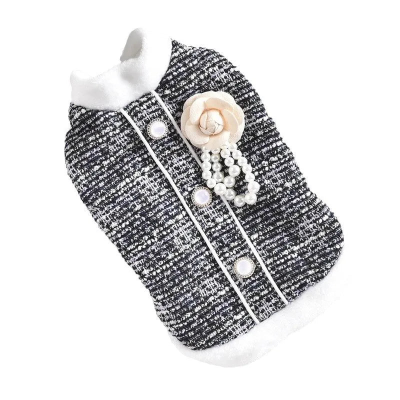 Black PU sausage dog style jacket on a small cat.