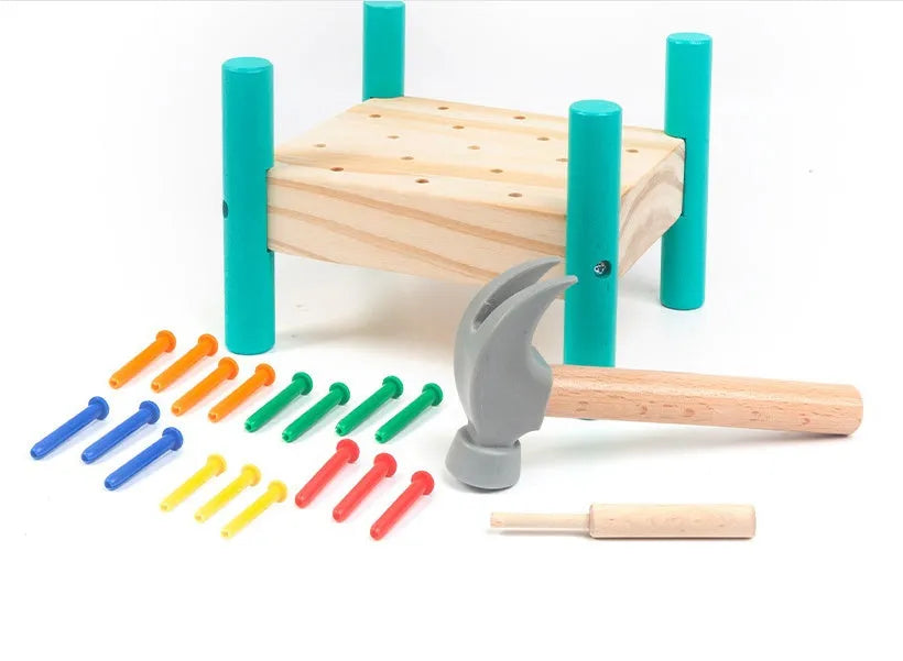 Wooden hammering nail toy with 17 coloured nails, hammer, reverse knock and nail plate, 19 x 13.5 x 16 cm