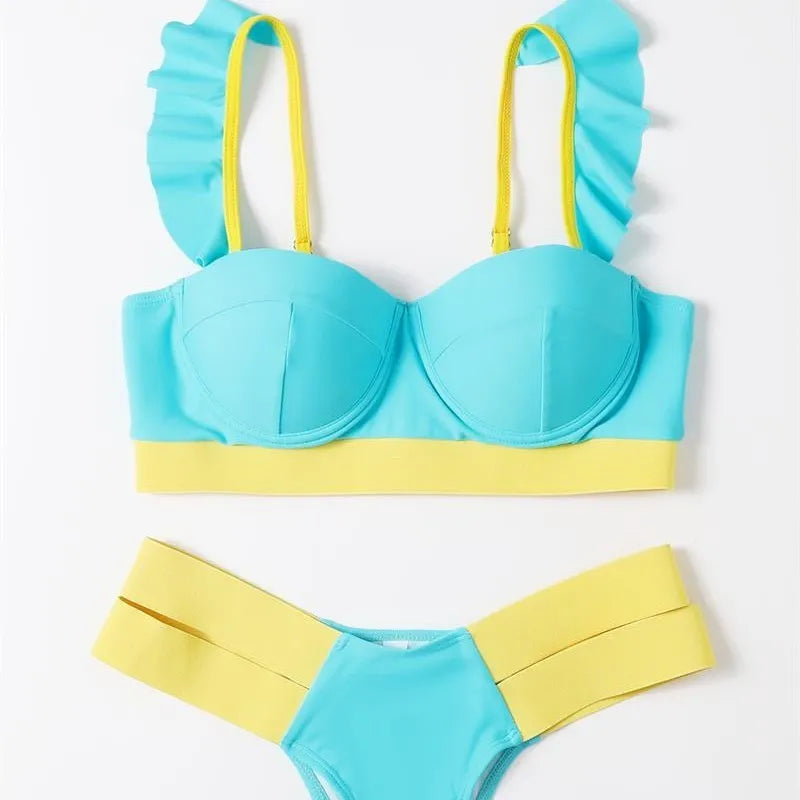 Women's contrast colour bikini swimsuit with steel push-up bracket, shown in rose red.