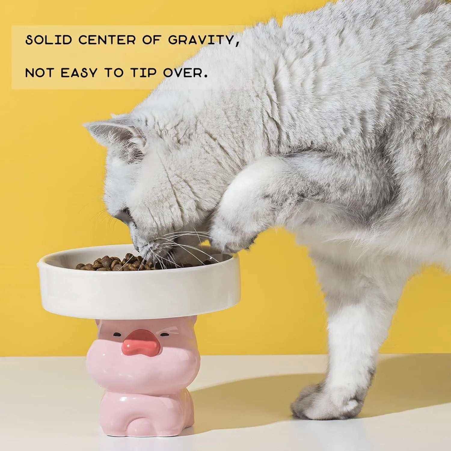 Raised ceramic cat bowl with animal design, showing 4.92-inch elevation and 5.9-inch wide opening for whisker-friendly feeding