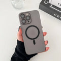 Ice Mist coloured frosted magnetic all-inclusive case for iPhone on a MagSafe charger