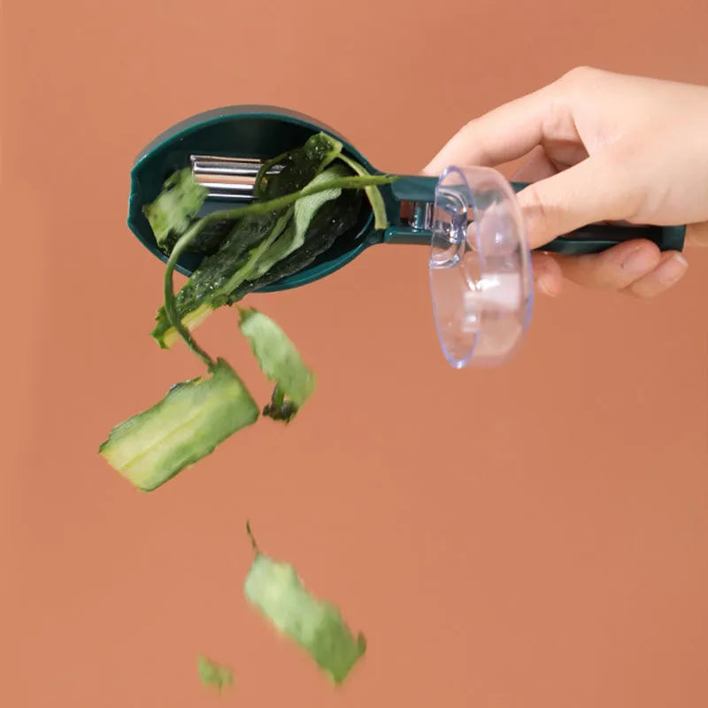 Yellow peeling knife with attached plastic storage lid for fruit and potato peelings