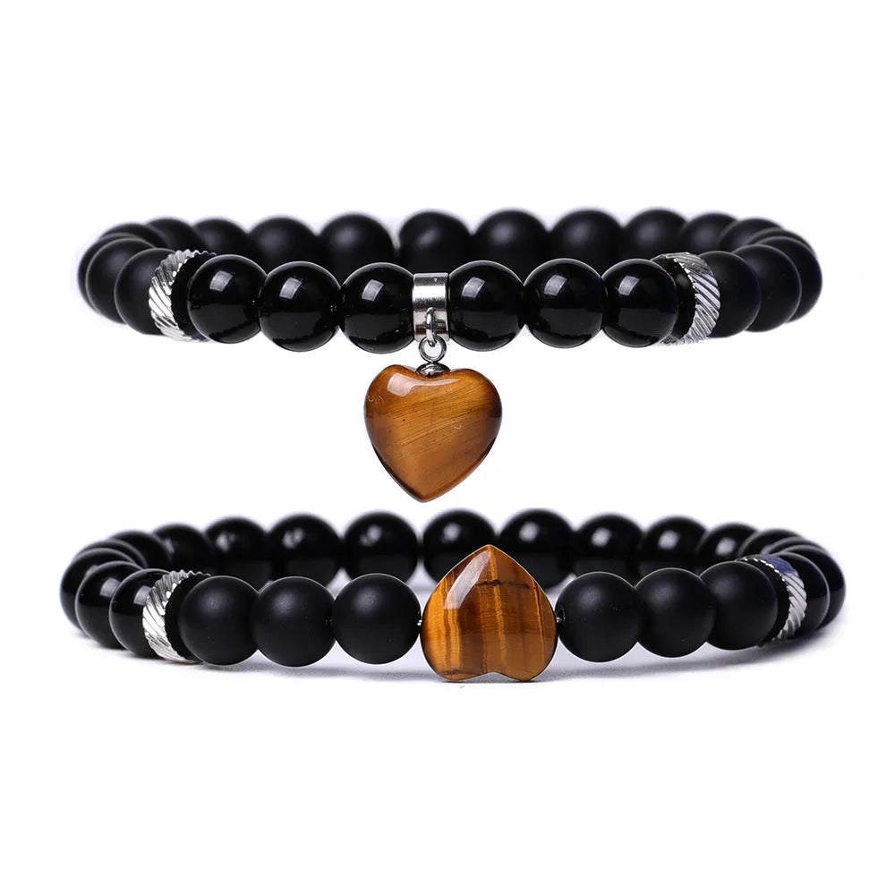 Matching natural stone couple bracelets with polished gemstone heart pendants