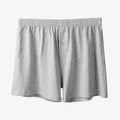 Men's high-waist cotton boxer shorts in light grey, navy blue, and black colours showing knitted fabric texture
