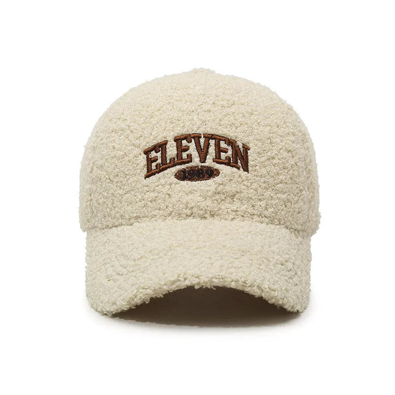 Adjustable winter baseball cap in polyester fabric with machine embroidery detailing