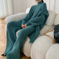 Women's knitted three-piece set with wide-leg trousers, sweater, and cardigan in solid colour with leather stitching details