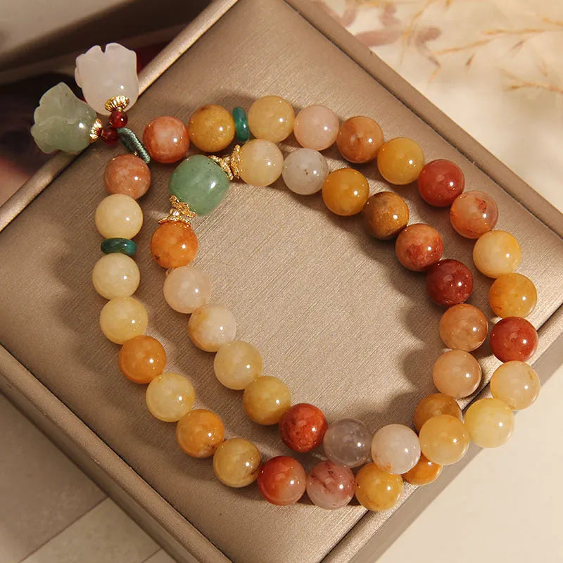 Natural jinsi jade multi-layer bracelet for women showing adjustable knotted design with orchid pendant detail
