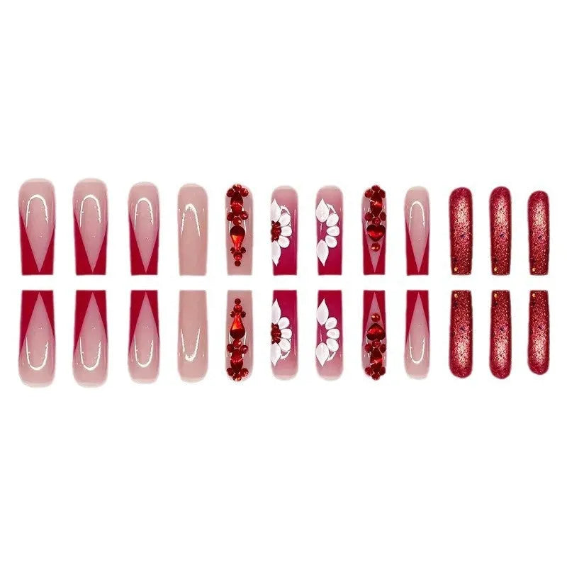 24 floral fake nails with red diamond accents, jelly glue, and nail file for at-home manicures