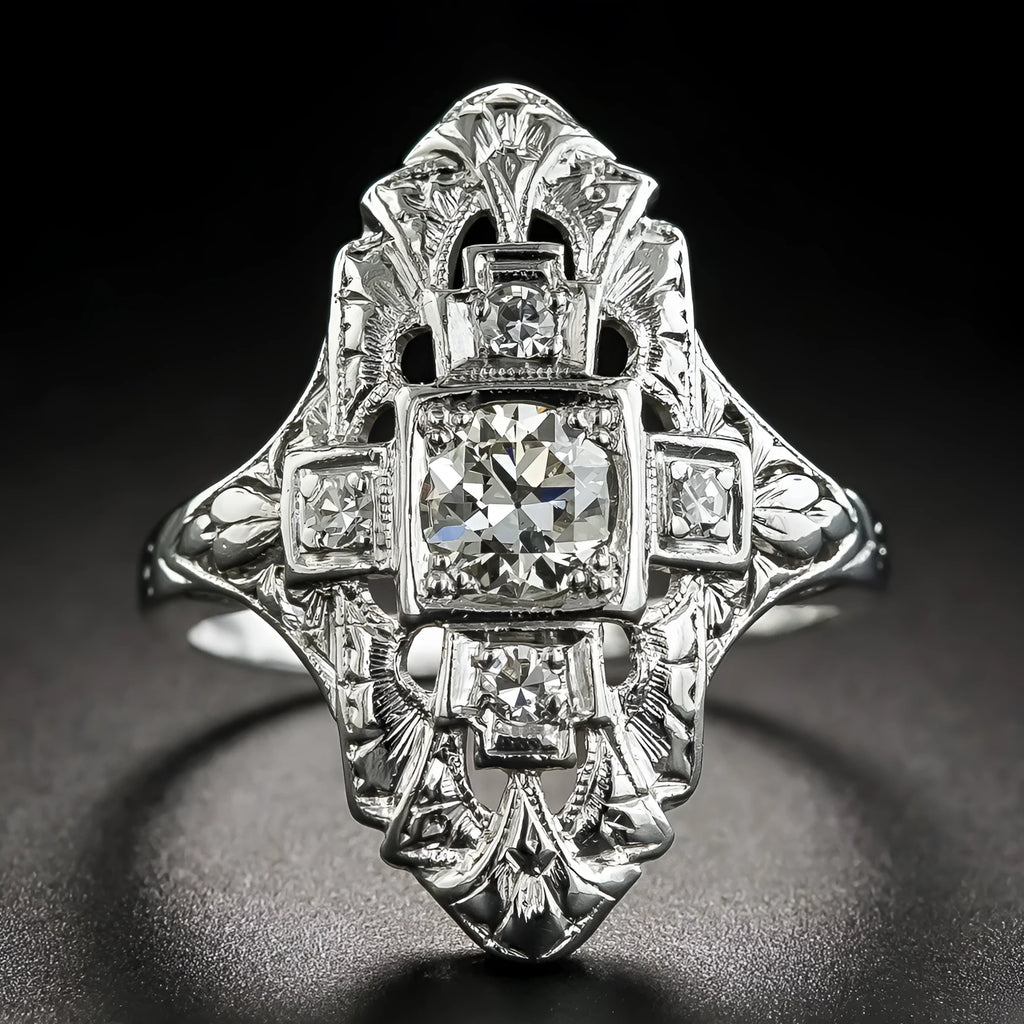 Silver electroplated hollow geometric diamond-studded ring showing negative space band design