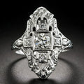 Silver electroplated hollow geometric diamond-studded ring showing negative space band design