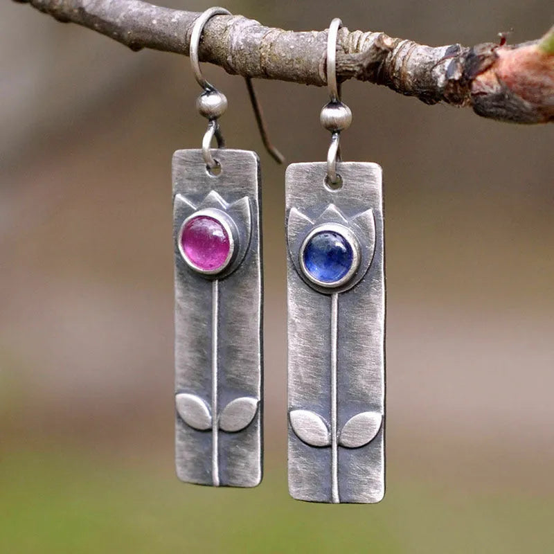 Antique finish geometric earrings with 8mm oval red sapphire centre stone on sterling silver