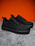 Flat heel casual board shoes with mesh upper and EVA sole in black or white colours