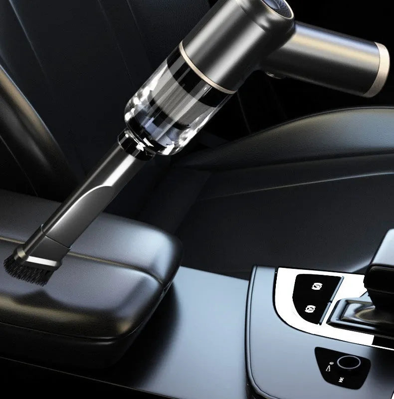 Black wireless vehicular small vacuum cleaner with attachments for car and home cleaning