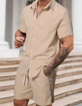 Men's striped printed casual suit set featuring a short sleeve shirt and matching shorts on a hanger.