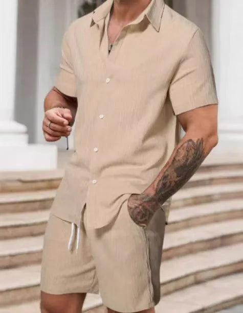 Men's striped printed casual suit set featuring a short sleeve shirt and matching shorts on a hanger.