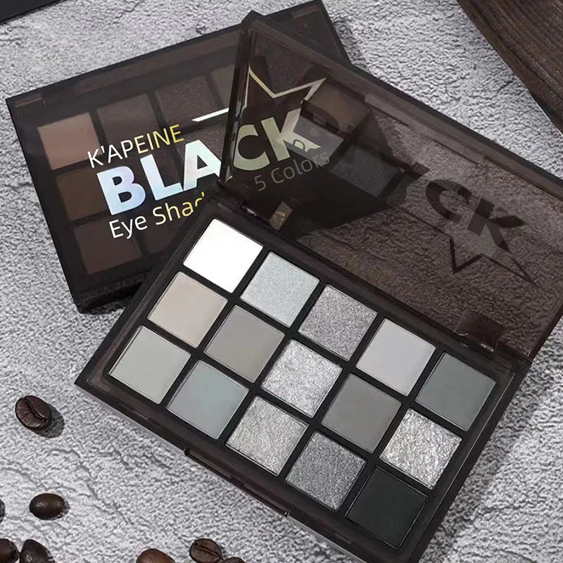 15-colour eyeshadow palette open showing matte and shimmer shades including browns and blues