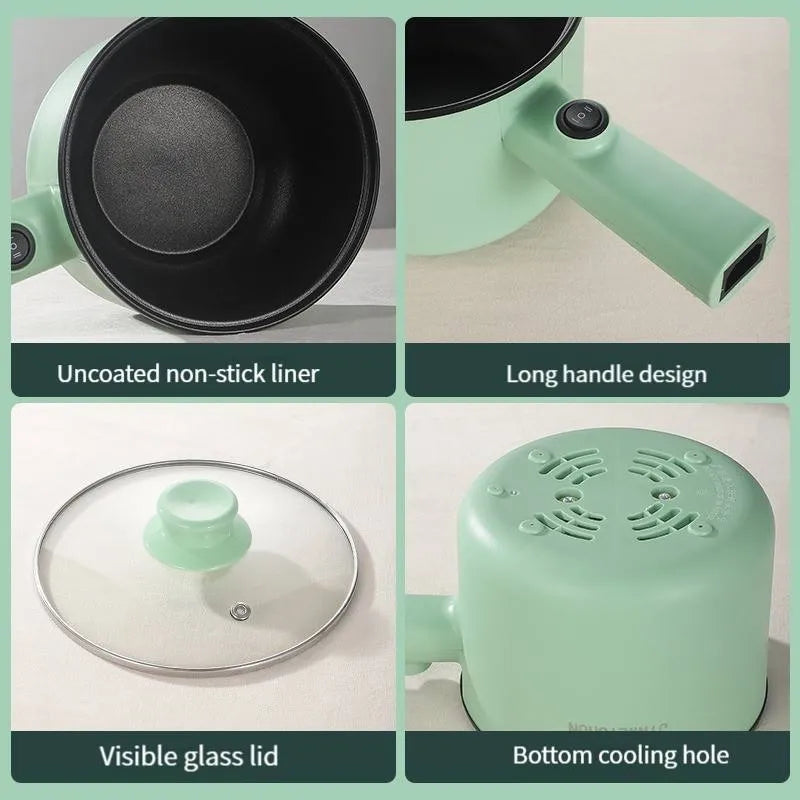 White and green mini electric hot pot cooker with stainless steel body and cooking accessories on a kitchen counter.
