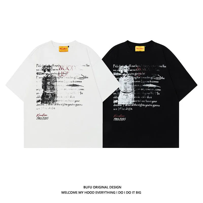 Men's black loose fit cotton t-shirt with white letter print and raglan sleeves on hanger