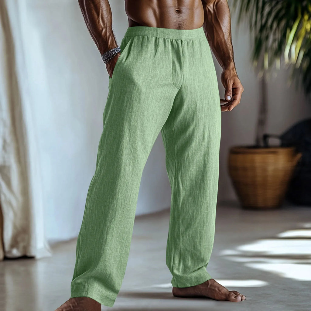 Cotton and linen straight-leg trousers in light green colour with multiple pockets, showing British style design.