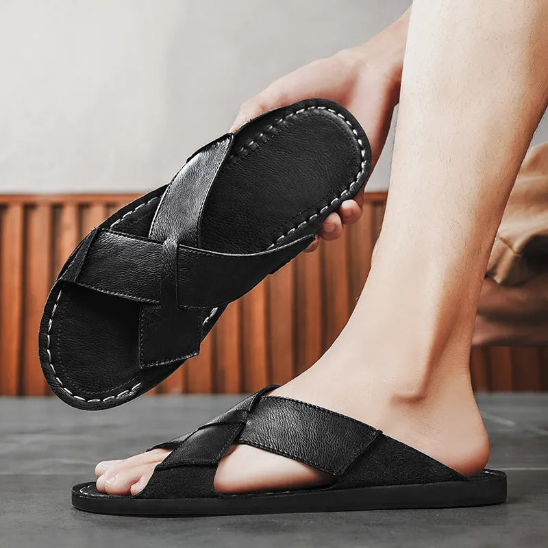 Men's black frosted genuine pigskin leather slip-on sandals with a sewn rubber sole.
