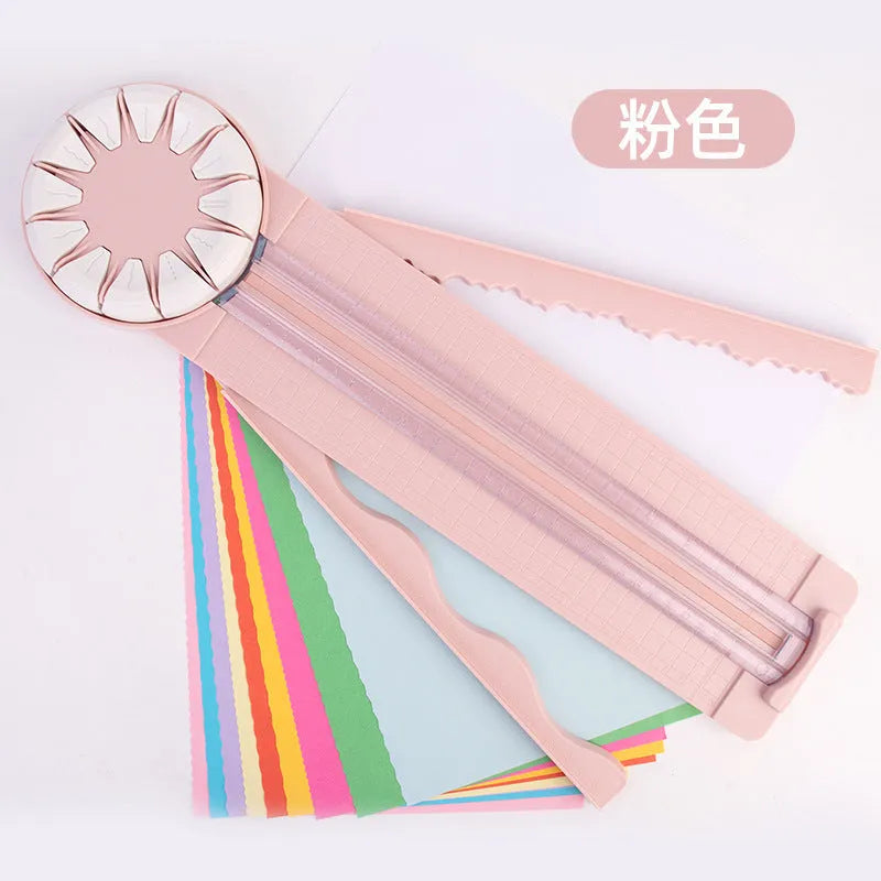 Pink and black 12-in-1 paper cutter with dotted plastic surface measuring 46.2cm
