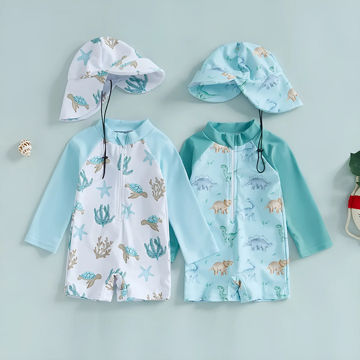 Children's one-piece swimsuit with long sleeves and hat in dinosaur light green or white and blue, sizes 70-110