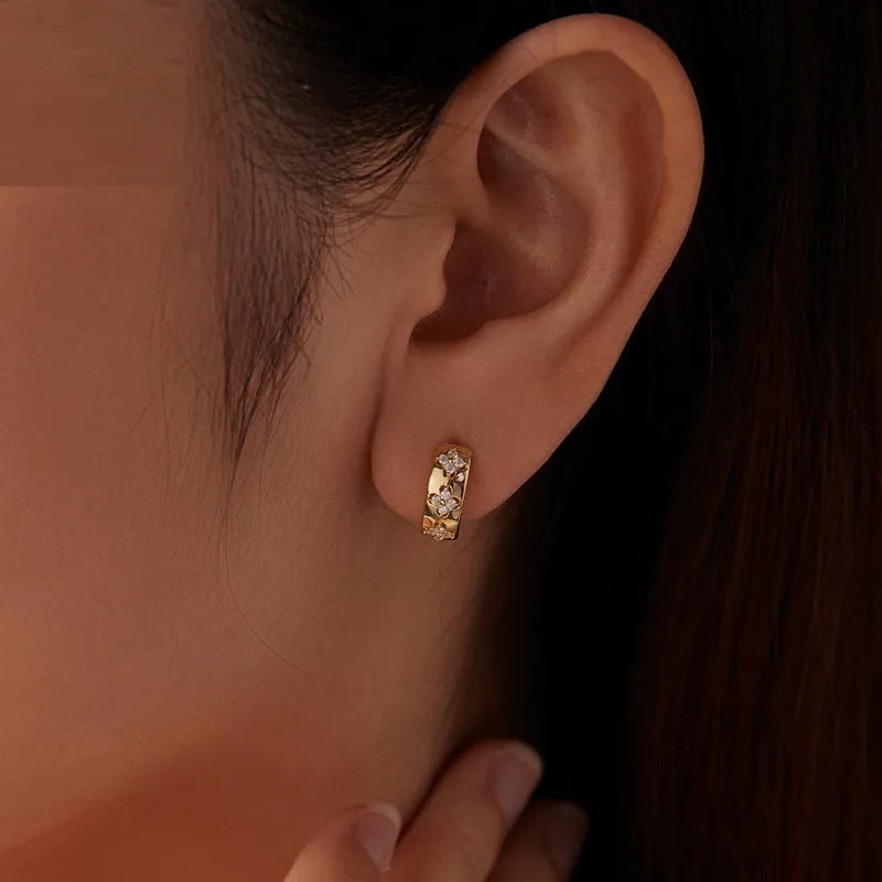 S925 sterling silver earrings with moissanite inlay and a three-petal grass design, unisex pair