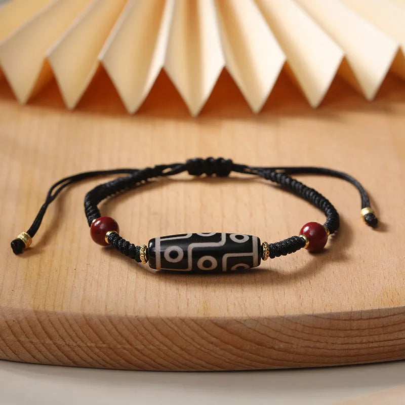 Tibetan agate dzi bead bracelet with stainless steel adjustable clasp showing 30 models of beads