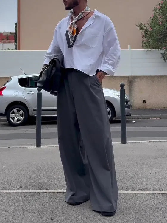 Grey men's high-waisted wide-leg casual trousers on a hanger.