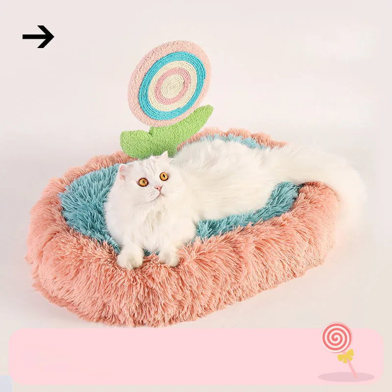 Pink elliptical lollipop shaped plush cat bed with raised sides, showing a removable cover.