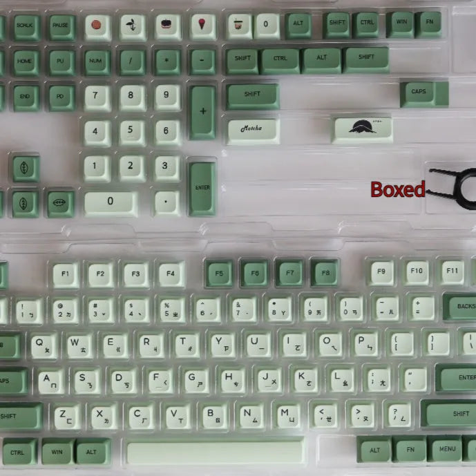 124 Matcha green PBT keycaps with white dye-sublimated legends, arranged in a keyboard layout.
