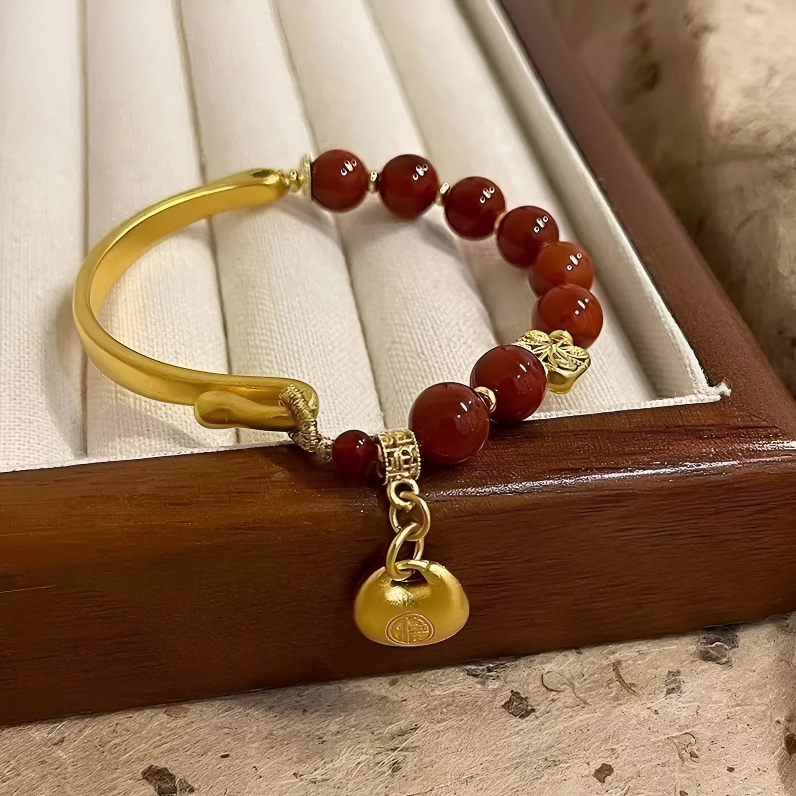 Golden Southern Red Agate character ingot bracelet with antique design on wrist