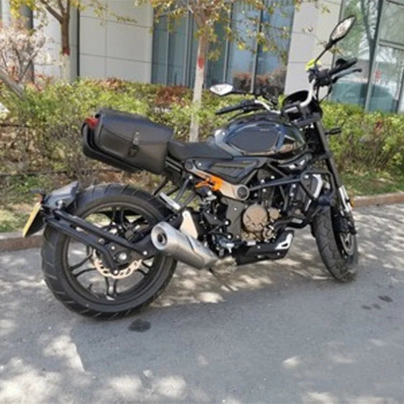 Black motorcycle swingarm bag mounted on Harley-Davidson Sportster with 30cm width dimensions