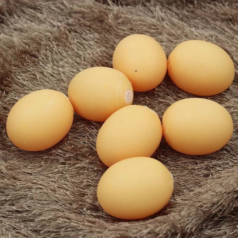 Simulation egg-shaped dog chew toy with squeaker sound for dental play