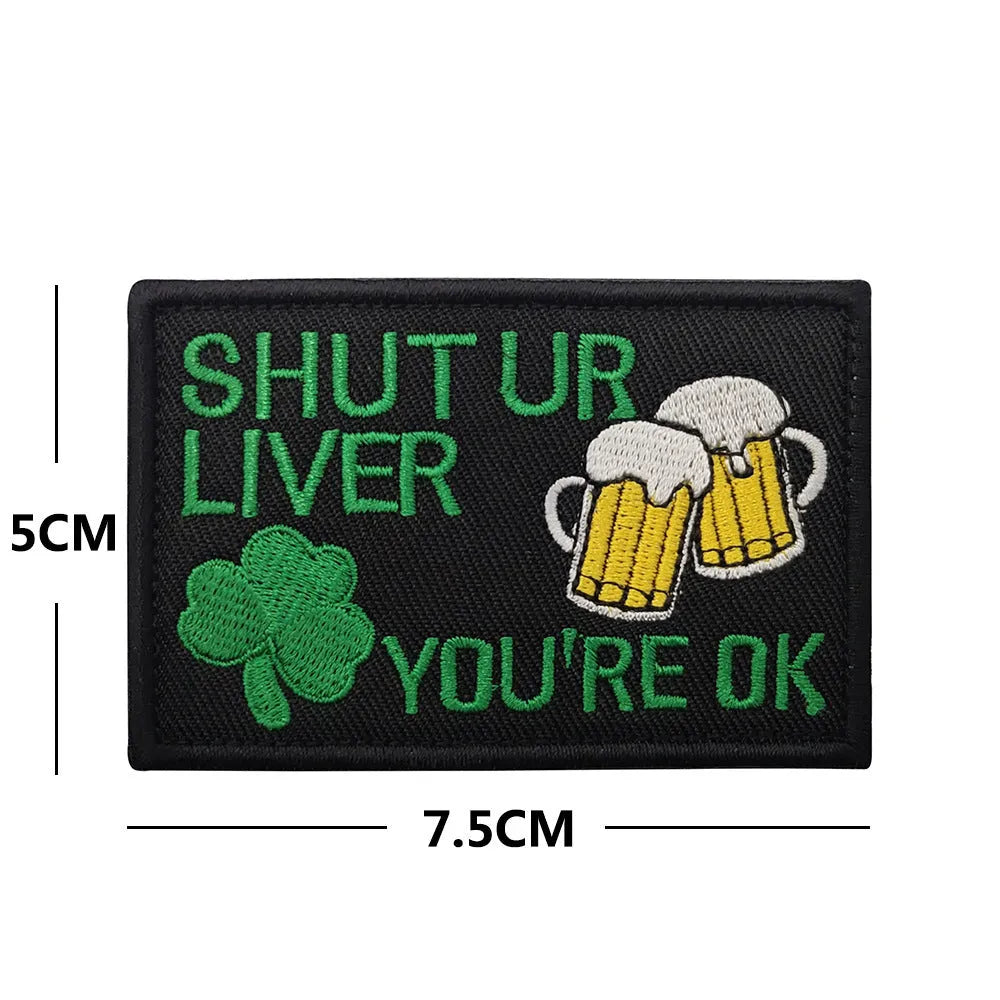 Embroidered fabric badge with Velcro backing showing detailed stitching on nylon polyester material